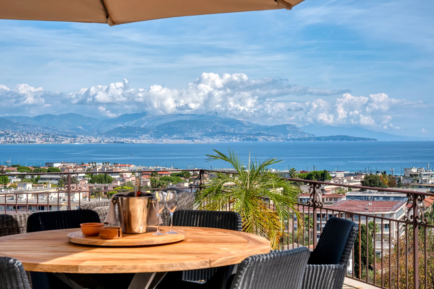 Breakfast table overlooking Antibes and the Mediterranean Sea