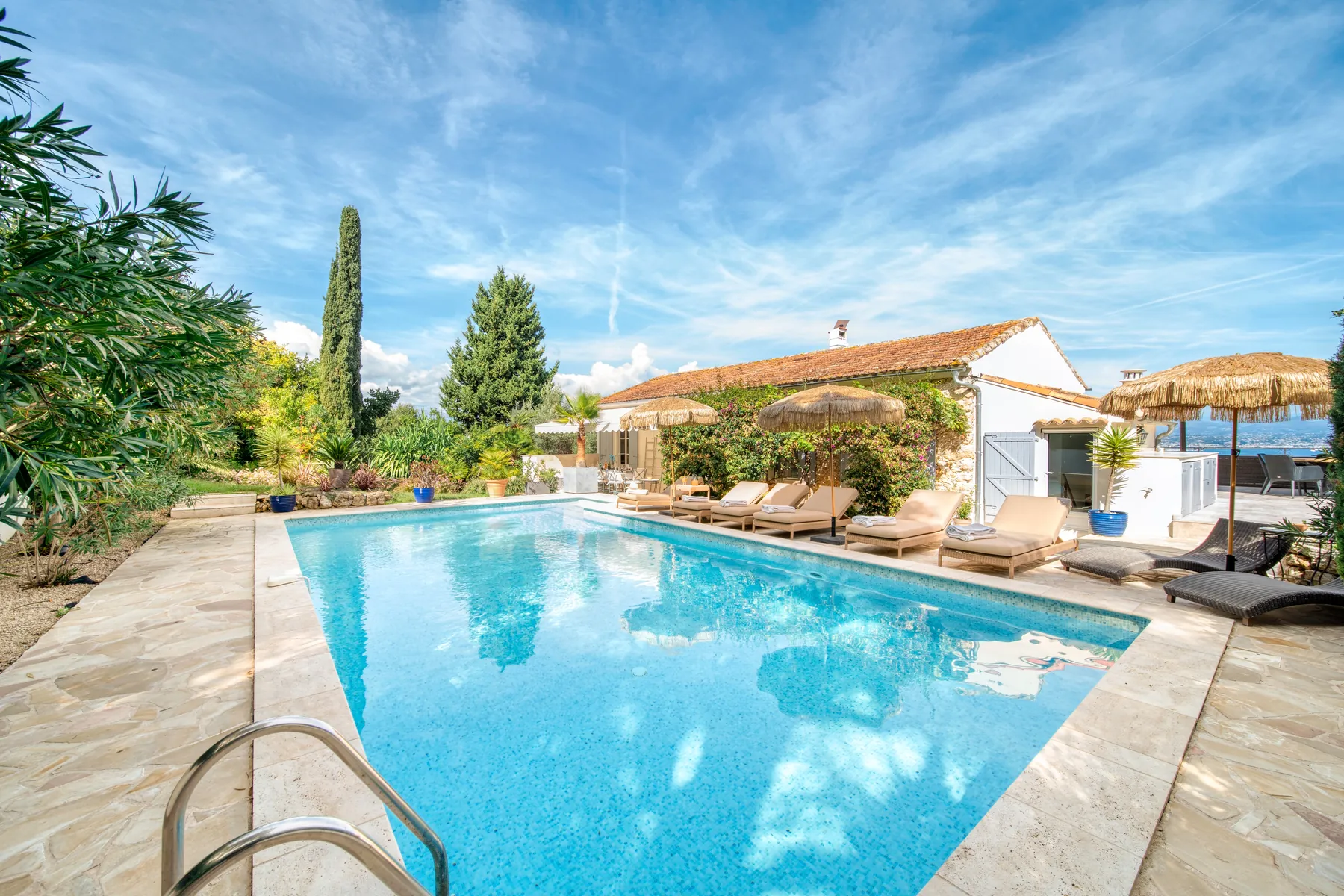 Private heated pool on the upper terrace with sea views