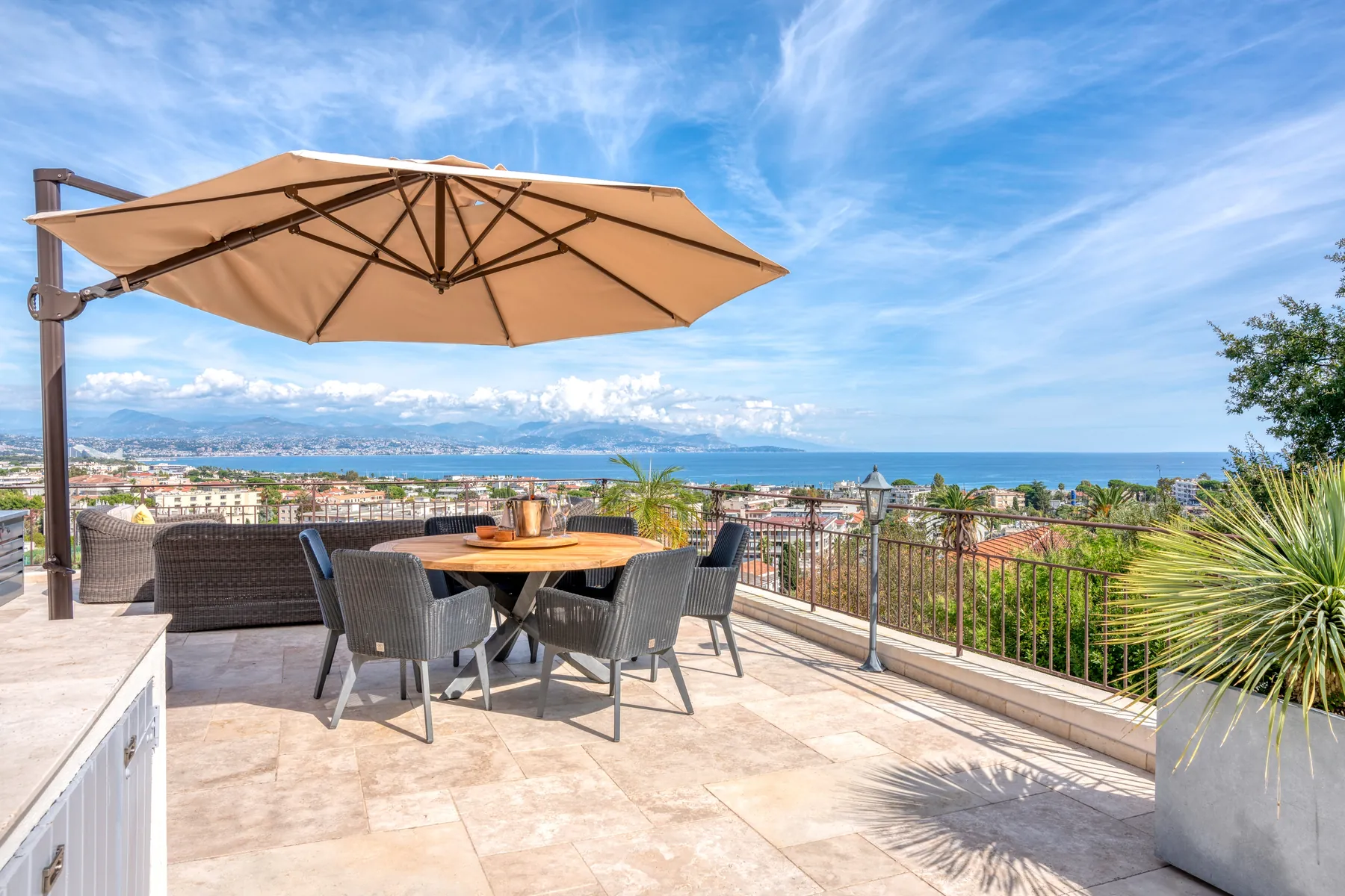 Dining terrace overlooking the Mediterranean coast