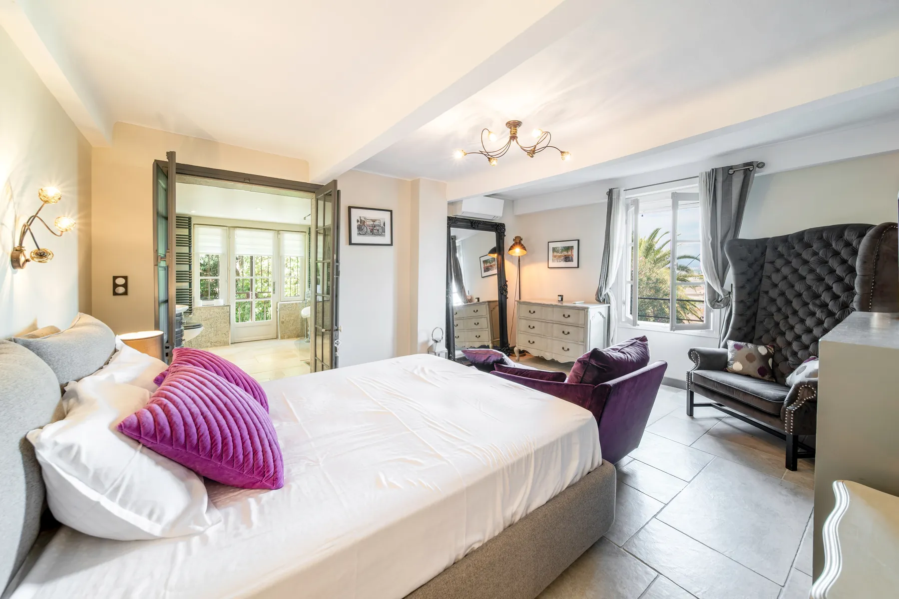 Bedroom 1 with a sea view and generous seating area
