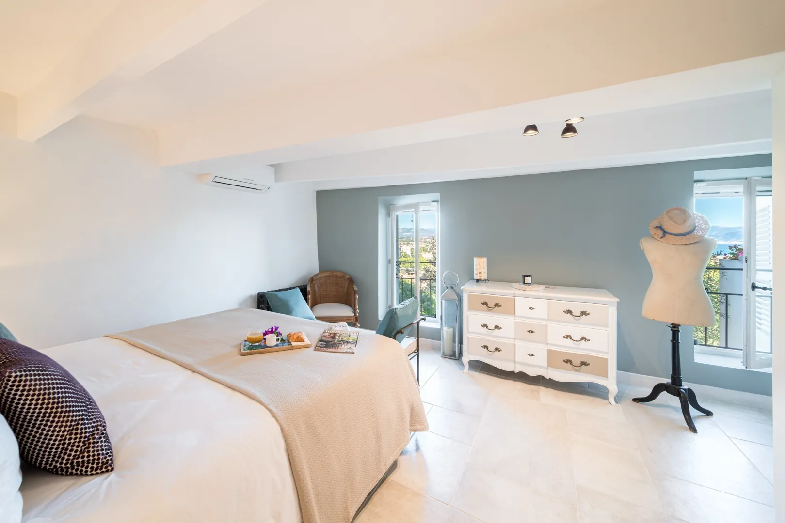 Bedroom 5 with a queen bed and terrace doors